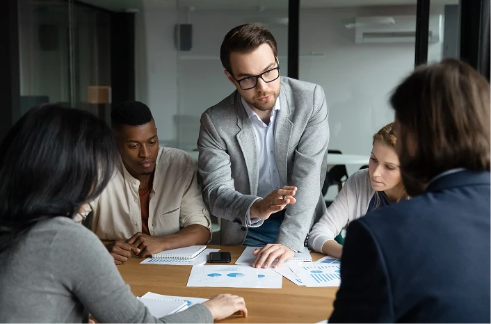 People making decisions in a meeting